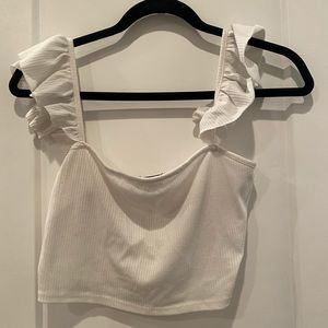 White ruffled shoulder crop top